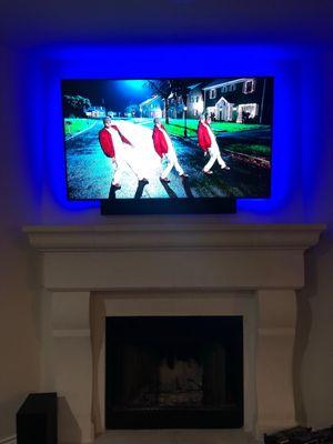 Tv and sound bar installation over fireplace. Love it!