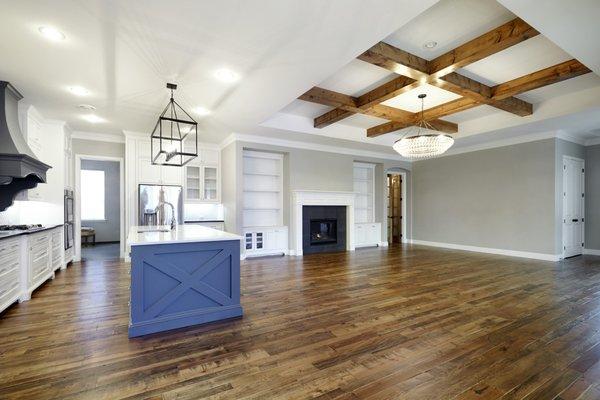 This reclaimed wood flooring looks stunning in this kitchen!