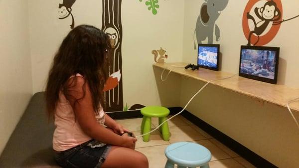 Patient playing with our office video games.