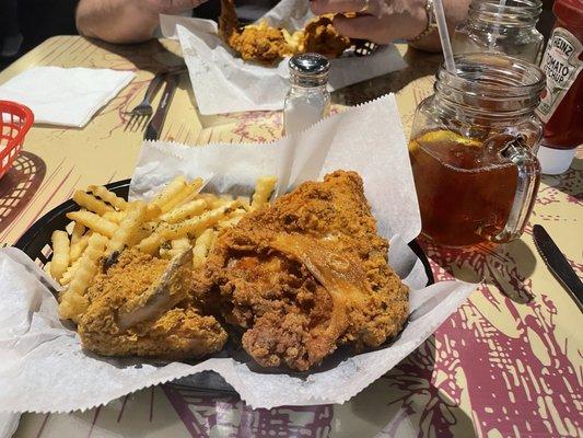 Chicken breast and wing with great fries and iced tea