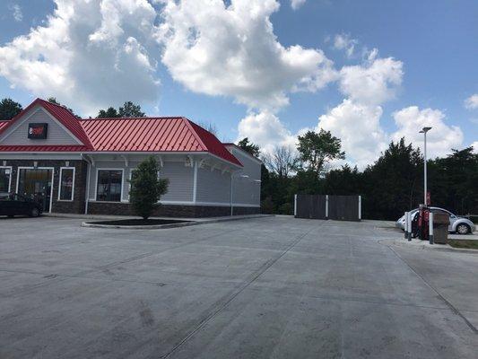 Spacious side parking lot and air pump.