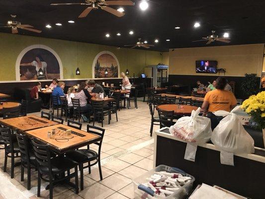 View from front door. Remodeling (Aug 2017) changing some booths to tables & installing tile floor