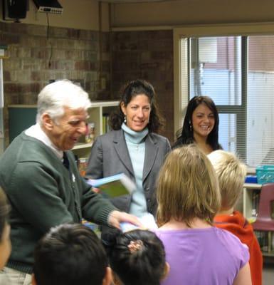 Mayor Dave and Principal Minor assisting Dictionary presentation