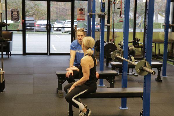 Coach Ellen giving some Bench Press tips