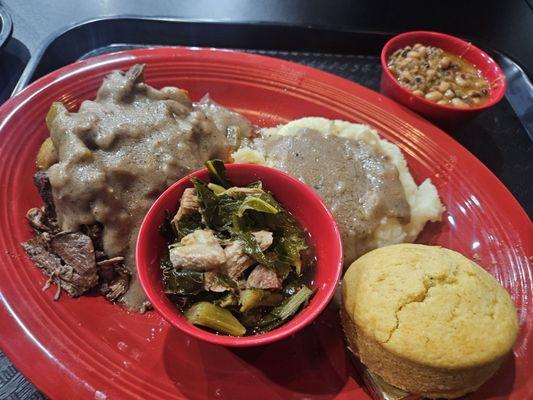 Pot roast,  collards, potatoes,  black-eyed peas, and coarnbread.