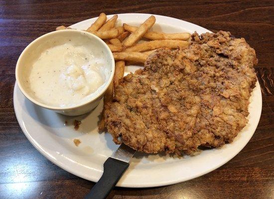 Huge chicken fried steak - perfectly cooked, tender and tasty !!