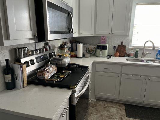 New cabinets, counter tops floor - complete after a fire.