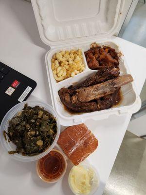 Rib dinner side of collard greens cornbread