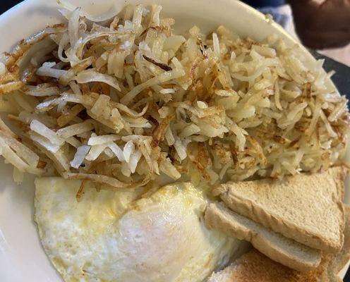 Eggs, hash browns and white toast