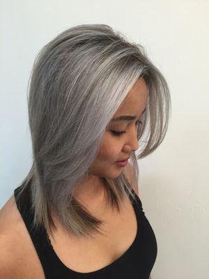 Super light and ashy highlights on naturally black hair using Goldwell hair color.