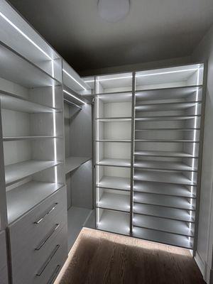 Closet with integrated lighting.