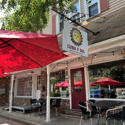 Entrance with outdoor dining on Main st.