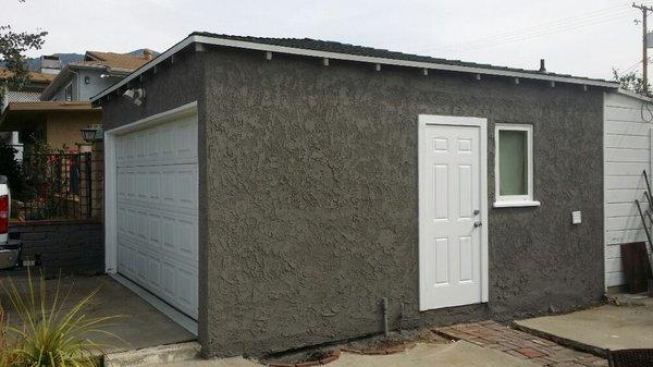 Exterior repaint on house and detached garage in Burbank CA.