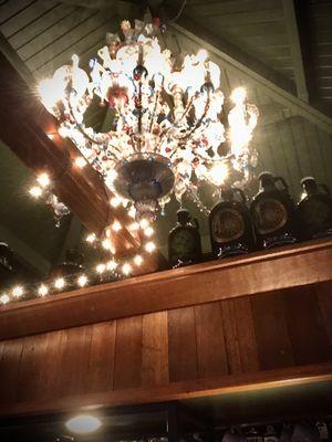 Chandelier above bar