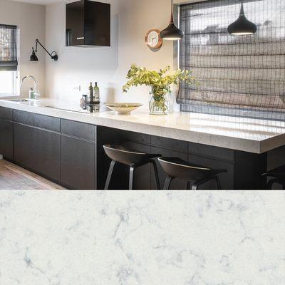 Noble Carrara, Technistone. Great contrast in your kitchen, so elegant!