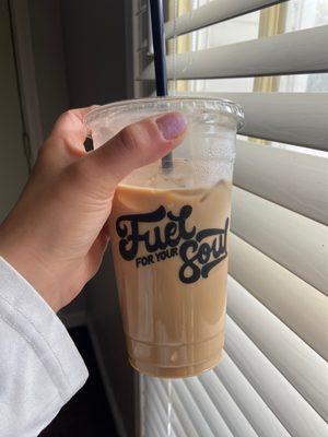 White butter pecan iced latte with oat milk