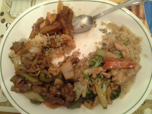 A mix of chicken w/ broccoli, hot n spicy beef, eggplant n chicken w/ garluc sauce, and fried rice