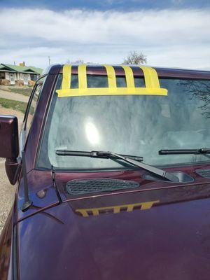 Passenger side windshield trim became loose and almost fell off because clips were not installed just a ton of adhesive.....