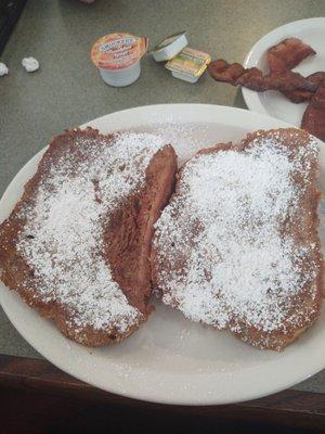 French toast meal with side of bacon