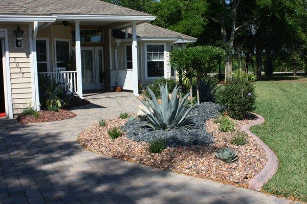 Southwest themed landscape with a variety of cacti