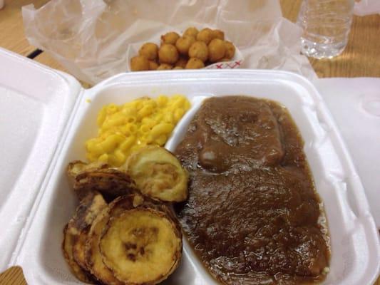 Friday special-country fried steak with Mac and cheese, fried squash, and hush puppies