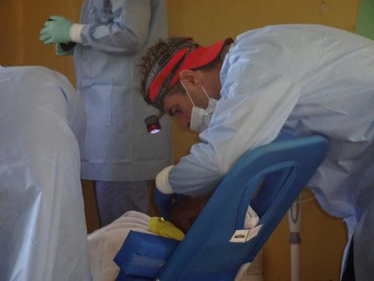 Dr. Jenkins providing relief from dental pain in a remote village.