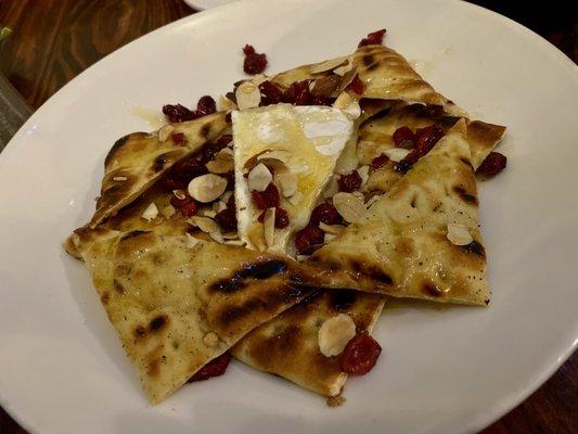 Wild Flower Honey Baked Brie Dried Cranberries - Almonds - Grilled Flat Bread.