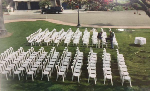 White Bistro Chair Set-up for Ceremony.