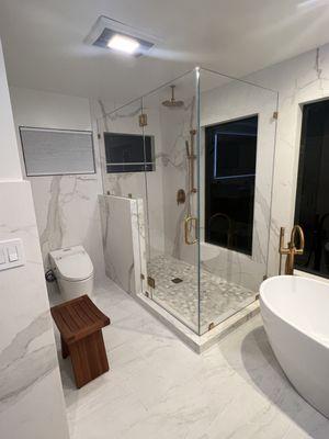 Porcelain slabs shower wall.