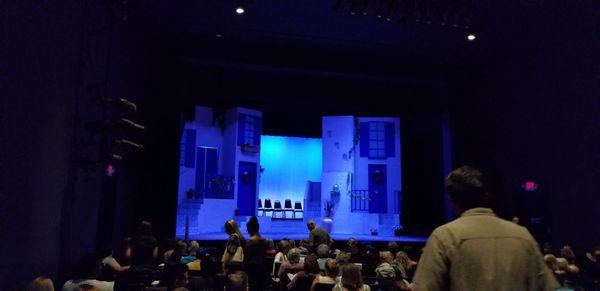 Taking in a show. The set of Mama Mia.