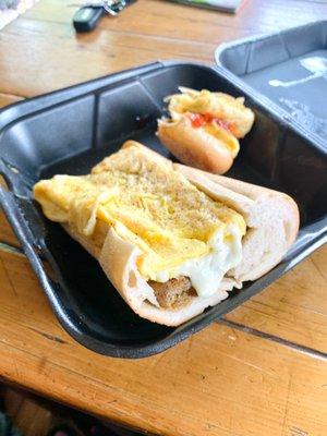 Scrapple, egg, and cheese on a long roll