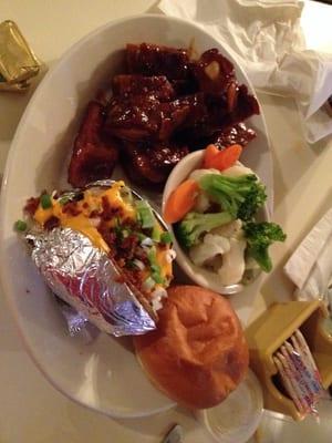 Rib tips with baked potato and veggies