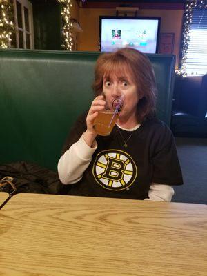 The wife enjoying a beer and the Bruins