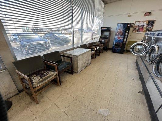 Awful chairs and discarded dryer sheets on the floor.