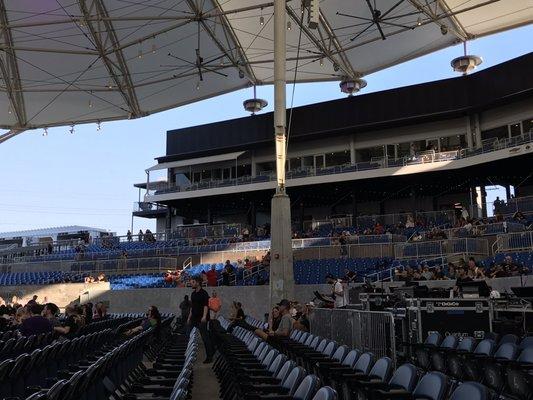 View of seats / stand and part of roof .