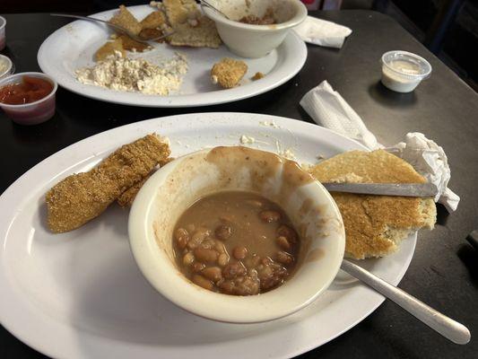 Catfish soup beans and fried potatoes with hole cakes .Great food good service