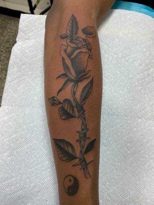 My tattoo! Rose stem with barb wire