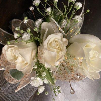 My daughters corsage. Gold accents are subtly done which makes it soooo intriguing and those diamonds.....