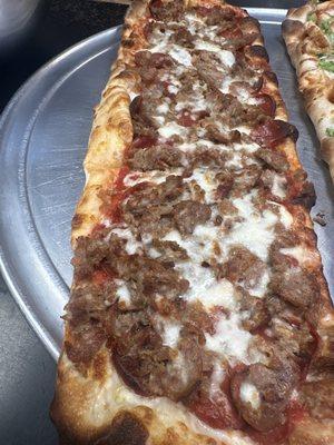 Pepperoni and sausage flat
Bread