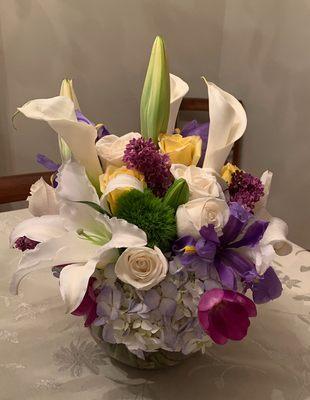 My friend absolutely LOVED this sympathy arrangement. I made minimal suggestions and this is what she came up with. Gorgeous, smelled great!