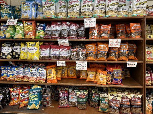 Sturgis pretzels and smaller local brands along this wall of snacks.