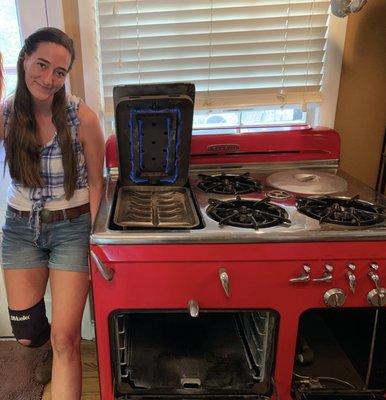 Technician Aubrey Bradley fixing a 68 year old Chambers gas range