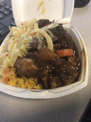 Ox Oxtail Dinner. Yellow rice and cabbage