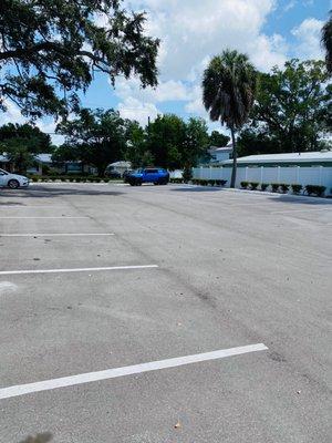 HUGE parking lot behind the building in addition to side parking.