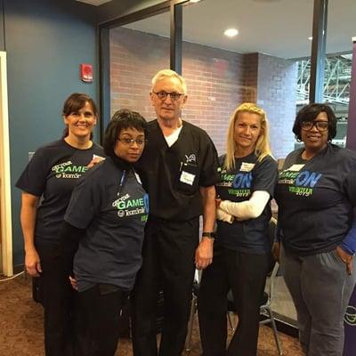 PDG Volunteers for the children at Ford Field with the Detroit Lions.  Dr. Regula & Staff, Henry Schein & Team Smile