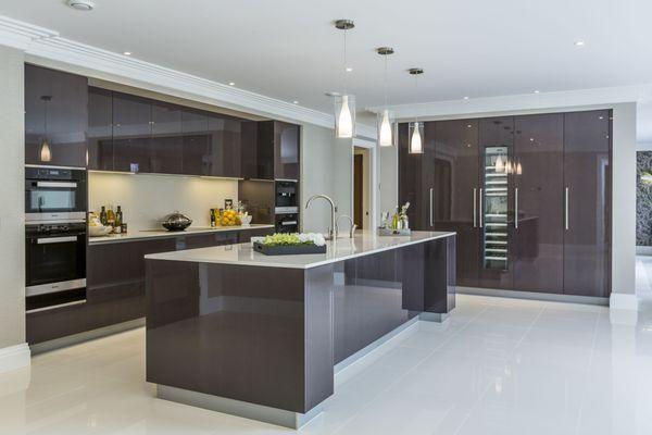 Residential - Luxury Kitchen... Cabinets, Island, Sink, Backsplash, Counter-top(s), Appliances & Lighting.