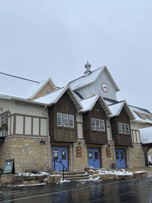 View of the brewery from the parking lot. Blue doors are the beer depot where you can go and buy cases of their beer.