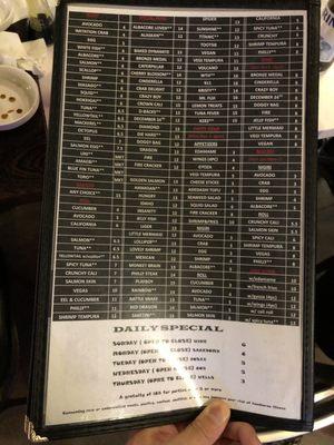 The menu states "A gratuity of 18% for parties of 5 or more". Also the shrimp tempura roll is listed as $8.