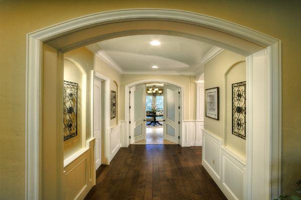 Recessed paneling,cased archway,doors