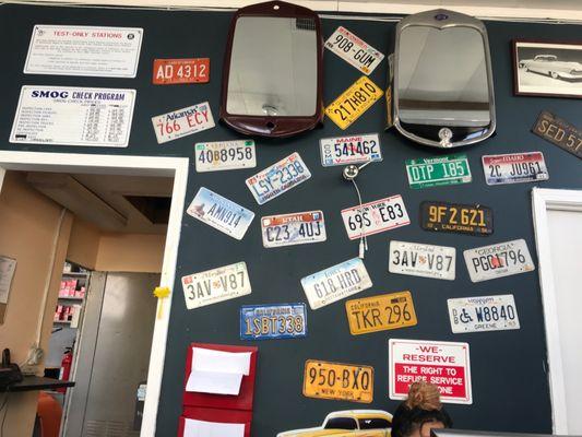 The License Plate display wall in the office area is really creative!